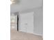 Upstairs bedroom with closet, plush carpet and a view of upstairs hallway at 179 Bradshaw Park Dr, Woodstock, GA 30188