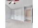 Cozy bedroom with vaulted ceilings, neutral carpet, closet, and light fixture at 179 Bradshaw Park Dr, Woodstock, GA 30188