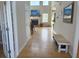 Inviting foyer with hardwood floors, leading to a spacious living area with fireplace at 179 Bradshaw Park Dr, Woodstock, GA 30188