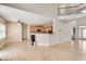 Spacious living room connected to the kitchen and entry way of home at 179 Bradshaw Park Dr, Woodstock, GA 30188