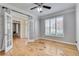 Spacious office with hardwood floors, French doors, and large window at 179 Bradshaw Park Dr, Woodstock, GA 30188
