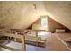 Unfinished attic space with exposed beams and plywood sheathing ready for customization at 3012 Asheton Ne Pl, Marietta, GA 30068