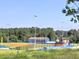 A well-maintained baseball field with lighting and support buildings for sporting events at 3012 Asheton Ne Pl, Marietta, GA 30068