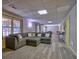 Spacious basement area with a comfortable sectional sofa and plenty of room to entertain at 3012 Asheton Ne Pl, Marietta, GA 30068