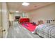 Basement room with a bed, entertainment area, and exercise equipment, perfect for guests or a home gym at 3012 Asheton Ne Pl, Marietta, GA 30068