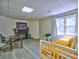 Cozy basement space includes a fireplace, TV, desk, and bed setup, creating a versatile living area at 3012 Asheton Ne Pl, Marietta, GA 30068