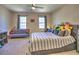 Bright bedroom with a comfortable bed, natural light, and neutral decor at 3012 Asheton Ne Pl, Marietta, GA 30068