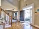 A grand foyer welcomes you with high ceilings, hardwood floors, and an abundance of natural light at 3012 Asheton Ne Pl, Marietta, GA 30068