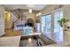 Bright kitchen with blue chairs, a fireplace, and access to the outdoors at 3012 Asheton Ne Pl, Marietta, GA 30068