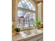Kitchen featuring a large window, a sink with a modern faucet, and a garden view at 3012 Asheton Ne Pl, Marietta, GA 30068