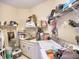 Laundry room with white cabinets, sink, shelving, and washer and dryer at 3012 Asheton Ne Pl, Marietta, GA 30068