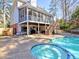 Backyard oasis featuring a pool, hot tub, and patio at 3012 Asheton Ne Pl, Marietta, GA 30068