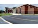 Brick school exterior with ample parking space, blending functionality with an attractive design at 3012 Asheton Ne Pl, Marietta, GA 30068