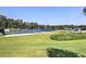 Outdoor tennis court featuring a lush green landscape and recreational facilities at 3012 Asheton Ne Pl, Marietta, GA 30068