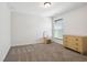 Cozy bedroom featuring a light and view, plus traditional furnishings, providing a serene space at 3774 Thackary Dr, Powder Springs, GA 30127