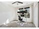 Bright bedroom featuring neutral walls, a large window with natural light, and a modern work station at 3774 Thackary Dr, Powder Springs, GA 30127