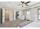 Open main bedroom showcases a door to the bathroom, walk-in closet, and a crib and seat at 3774 Thackary Dr, Powder Springs, GA 30127