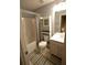 Full bath with tub/shower combo and built in shelving for storage at 102 Silver Fox Trl, Dallas, GA 30157