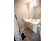 Neutral half bathroom featuring modern white vanity and light gray walls at 102 Silver Fox Trl, Dallas, GA 30157
