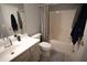Clean and well-maintained bathroom with a shower-tub combo and ample counter space at 102 Silver Fox Trl, Dallas, GA 30157