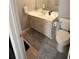Bathroom featuring neutral finishes, vanity with great storage, and modern faucet at 102 Silver Fox Trl, Dallas, GA 30157