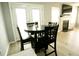 Dining area features an adjacent living room with a fireplace at 102 Silver Fox Trl, Dallas, GA 30157