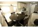 Kitchen and breakfast nook includes updated lighting and stainless steel appliances at 102 Silver Fox Trl, Dallas, GA 30157