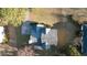 Overhead view of a home with a large driveway and a well-maintained lawn at 3152 Parks Run, Loganville, GA 30052