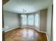 Bright dining area featuring tiled flooring and a modern light fixture at 3152 Parks Run, Loganville, GA 30052