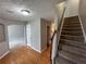 Spacious foyer with stairs leading to upper level of house at 3152 Parks Run, Loganville, GA 30052