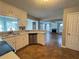 Open-concept kitchen featuring tile floors, stainless steel dishwasher and modern countertops at 3152 Parks Run, Loganville, GA 30052