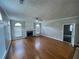 Spacious living room featuring a fireplace, hardwood floors, and plenty of natural light at 3152 Parks Run, Loganville, GA 30052
