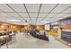 Finished basement with a bar area, comfortable seating, and a home theater setup at 4258 Rocky Ledge Way, Snellville, GA 30039