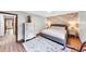 Comfortable bedroom with accent wall, dresser, and area rug at 4258 Rocky Ledge Way, Snellville, GA 30039
