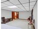 Unfurnished bedroom with a bed, classic rocking chair, and multiple entryways for versatile use at 4258 Rocky Ledge Way, Snellville, GA 30039