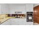 Modern kitchen with updated stainless steel appliances, granite countertops, and bright lighting at 4258 Rocky Ledge Way, Snellville, GA 30039