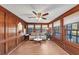 Charming sunroom with wood paneling, multiple windows offering natural light at 4258 Rocky Ledge Way, Snellville, GA 30039