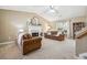 Spacious living room featuring a fireplace, vaulted ceilings and neutral decor, creating a welcoming atmosphere at 656 New Hope Rd, Lawrenceville, GA 30046