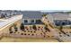 Aerial view of backyard with landscaping and a covered patio area at 100 Westchester Pass, Peachtree City, GA 30269