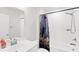 Well-lit bathroom with a patterned shower curtain and sleek fixtures at 100 Westchester Pass, Peachtree City, GA 30269