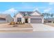 Charming one-story home boasts a well-manicured lawn and a two-car garage, perfect for suburban living at 100 Westchester Pass, Peachtree City, GA 30269