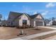 Well maintained home exterior with brick and siding, plus a two-car garage at 100 Westchester Pass, Peachtree City, GA 30269