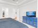 Spacious main bedroom features a tray ceiling, walk-in closet, and an ensuite bathroom at 100 Westchester Pass, Peachtree City, GA 30269