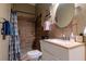 Modern bathroom with tiled shower, vanity, and contemporary fixtures at 4985 Union St, Union City, GA 30291