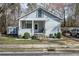 Charming single-Gathering home with a welcoming front porch and well-maintained landscaping at 4985 Union St, Union City, GA 30291