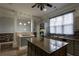 Bright and airy kitchen featuring granite countertops, stainless appliances, and modern lighting at 4985 Union St, Union City, GA 30291