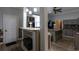 Modern kitchen with custom cabinets, granite countertops, and stainless steel appliances at 4985 Union St, Union City, GA 30291