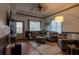 Cozy living room featuring a comfortable seating arrangement, natural light, and modern decor at 4985 Union St, Union City, GA 30291
