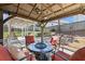 Backyard featuring pergola-covered patio with seating and an outdoor fan, offering a relaxing outdoor space at 1993 Shenley Park Ln, Duluth, GA 30097