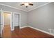 Spacious bedroom with a closet, sleek floors and neutral wall tone, perfect for relaxation at 1993 Shenley Park Ln, Duluth, GA 30097